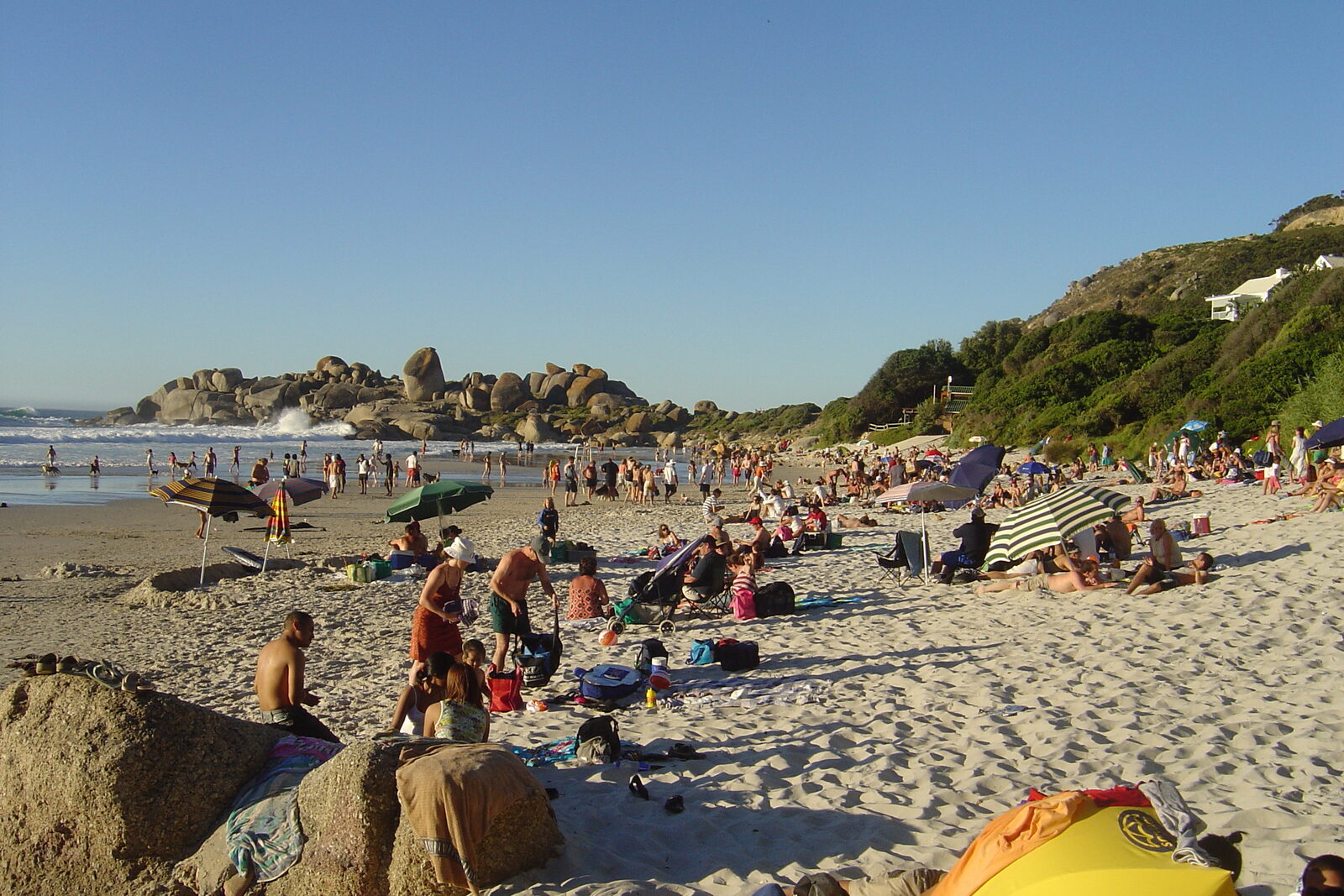 Llandudno Beach in Cape Town with granite boulders and turquoise Atlantic water