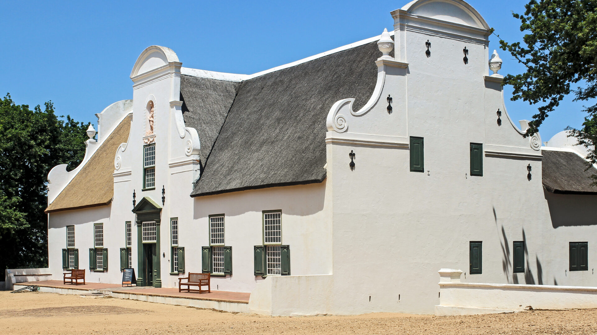 Groot Constantia homestead surrounded by vineyards on the Constantia wine route